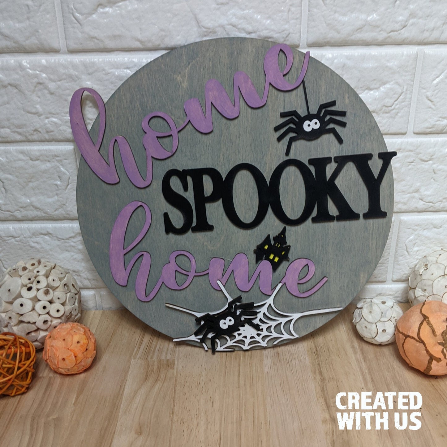 Halloween Round Sign: Home spooky home with spiders.